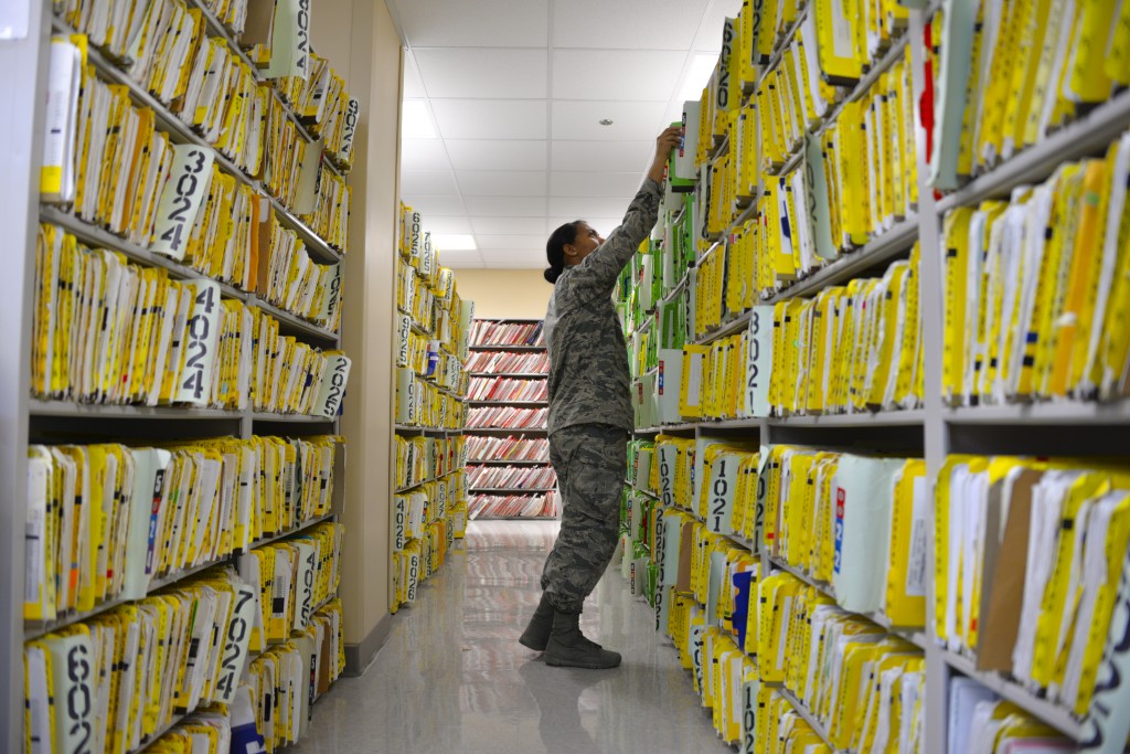 A US Airman files paper medical records. (Photo by US Air Force) 